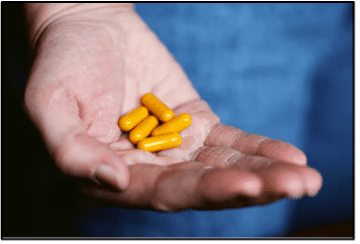 pills in hand