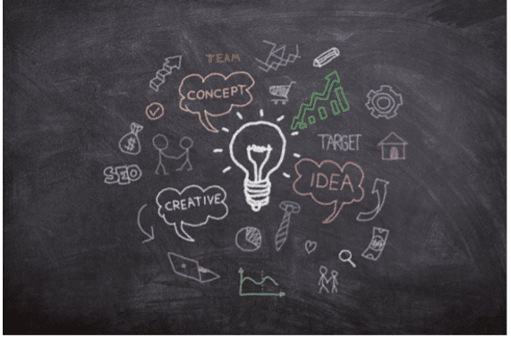 light bulb on blackboard with doodles