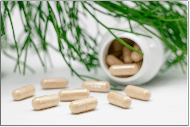 pills coming out of bottle